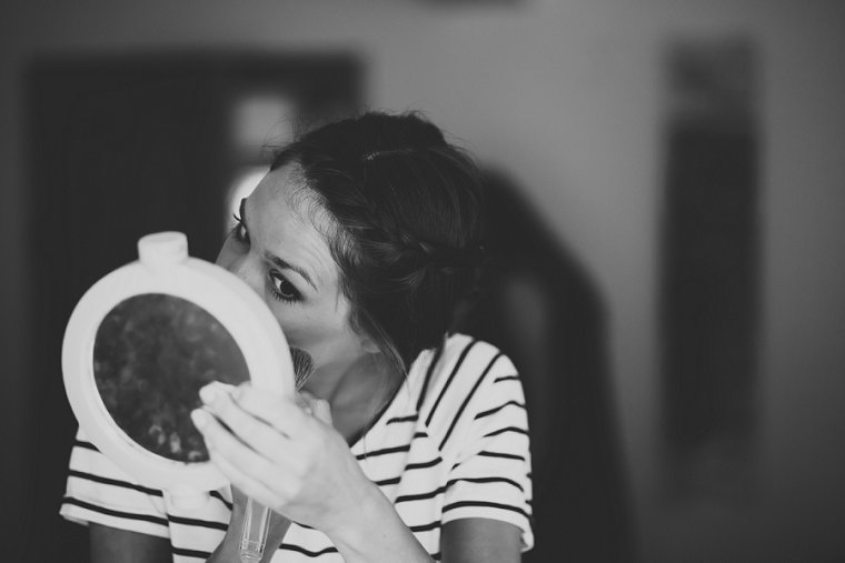 Bridesmaid doing her make up