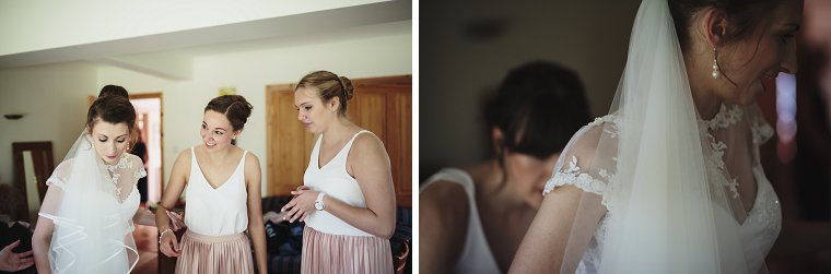 Bridesmaids helping bride