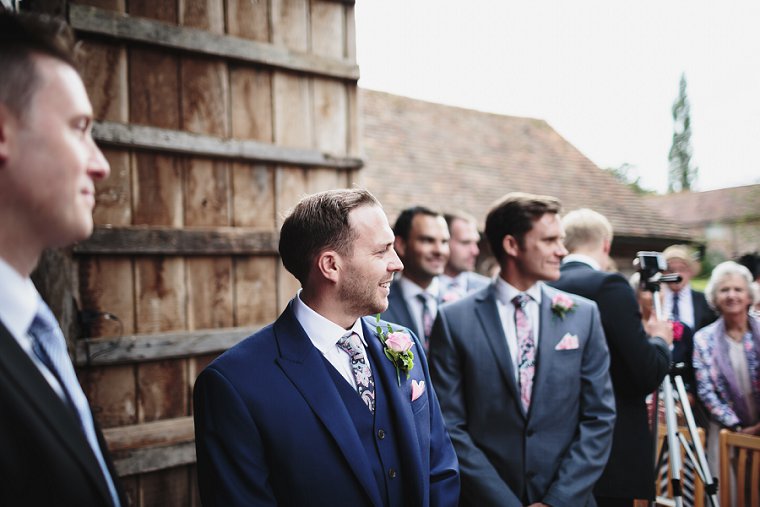 groom turning to look at bride