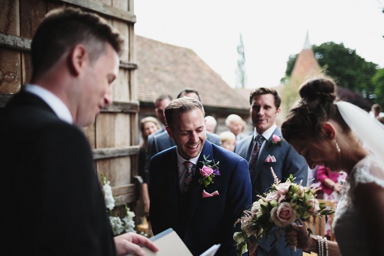 Groom laughing