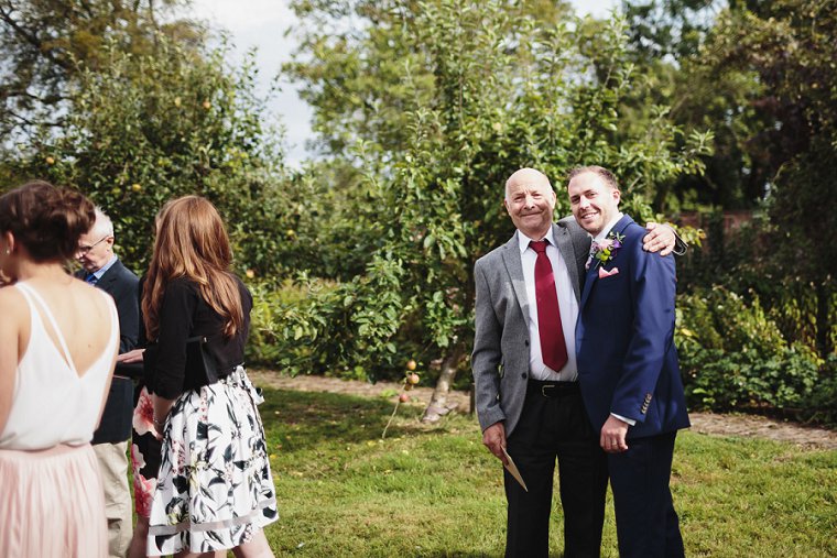Groom hugging his Dad