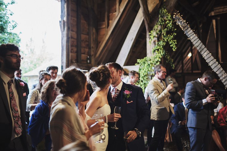 Bride kissing groom after his speech