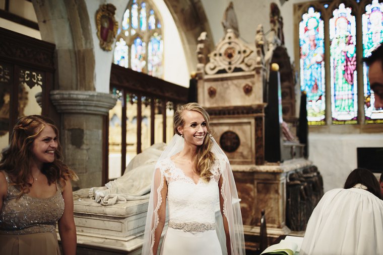 Bride smiling at groom
