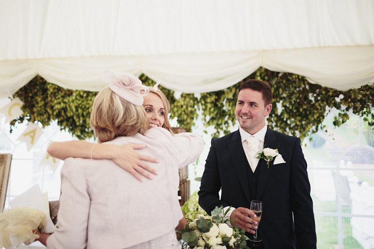 Bride hugging her mum