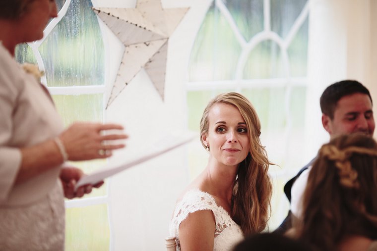 Bride looking emotional during mother of the brides speech