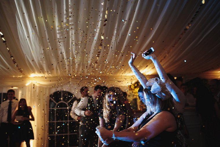 Indoor confetti cannon at wedding
