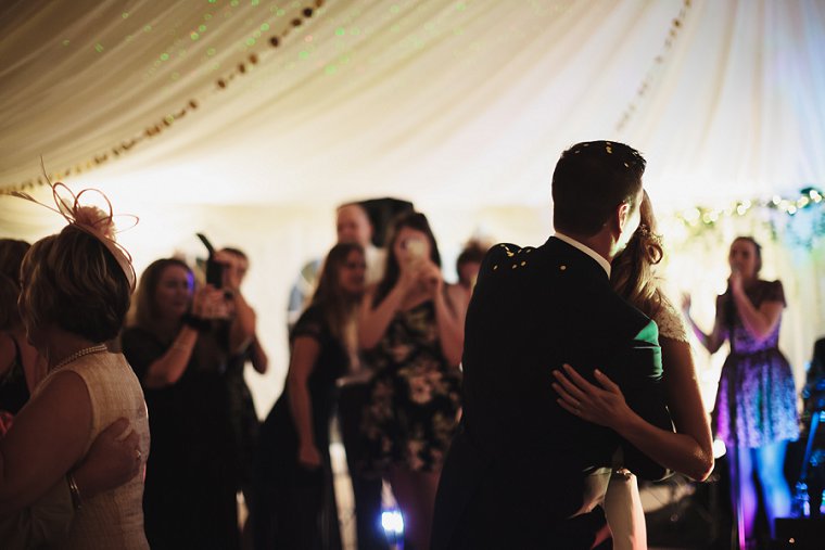 Bride and Groom hugging after their first dance