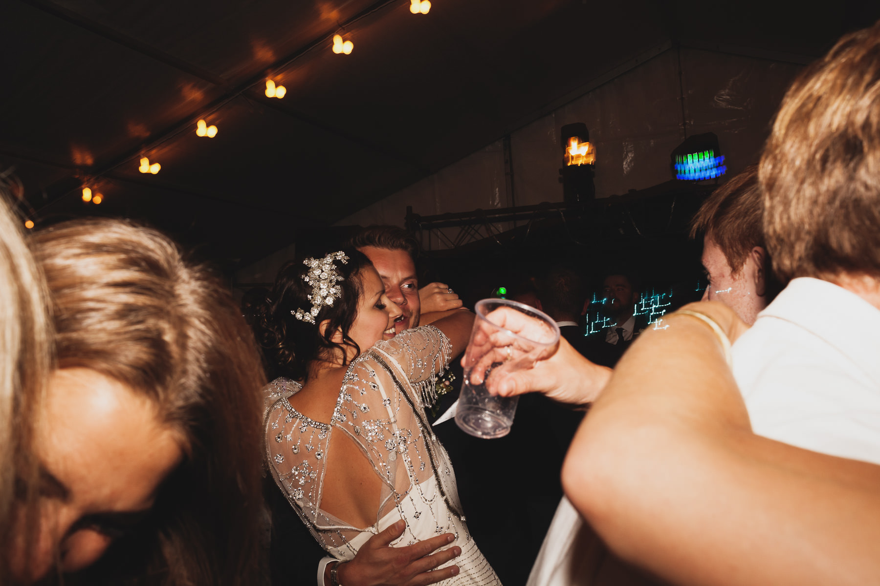 Wedding couple hugging after their first dance