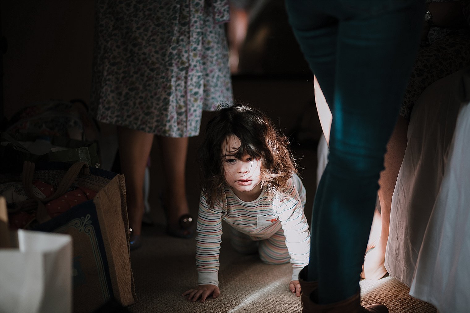 Brides daughter crawling on floor