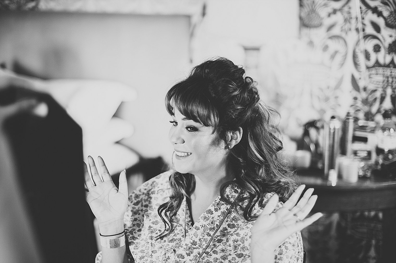 Bride looking in mirror