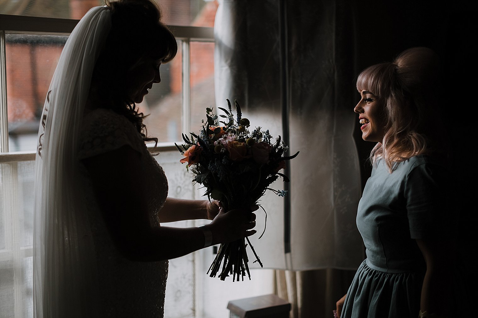 Bride and bridesmaid with Sweet William Florist Headcorn bouquet