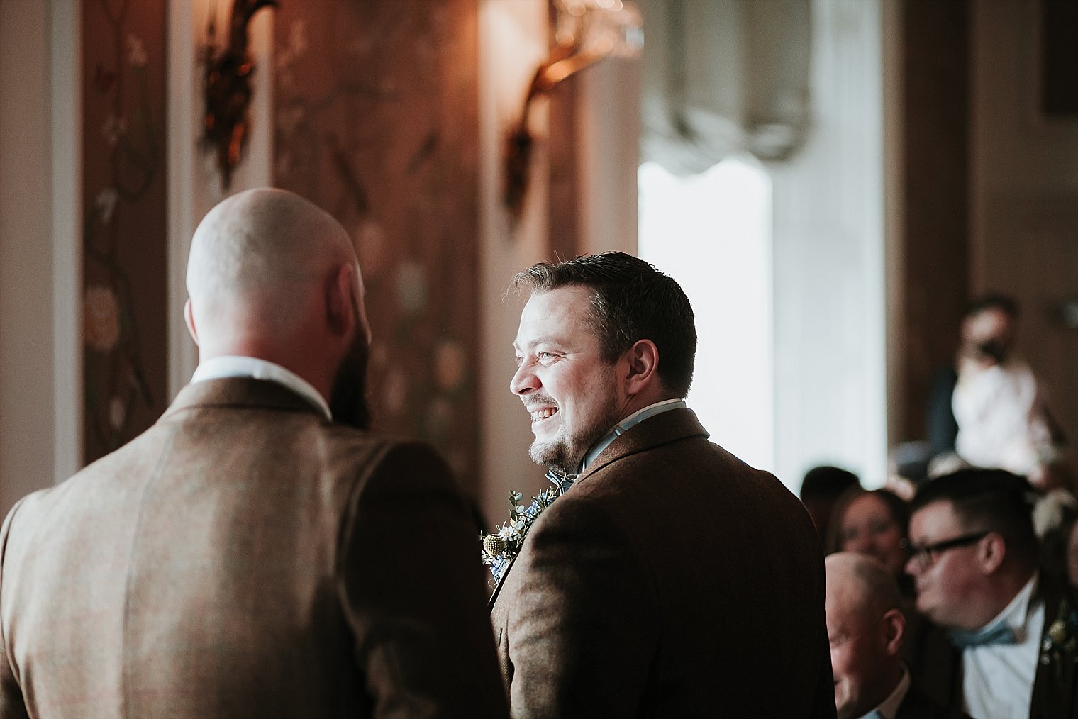 Best man laughing with the groom