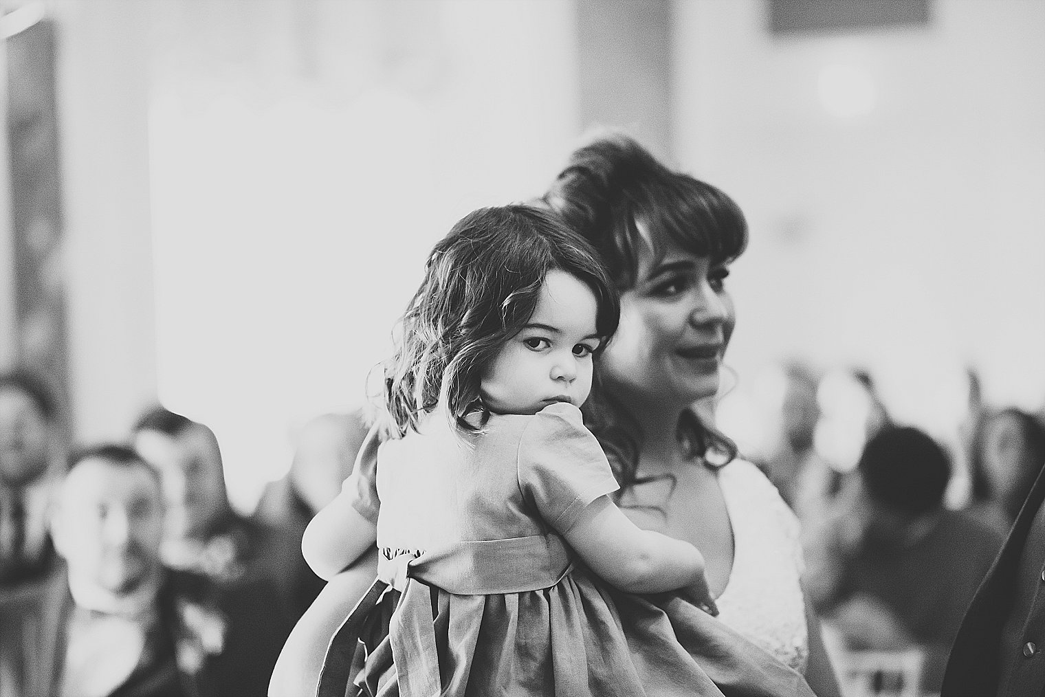 Bride holding her daughter