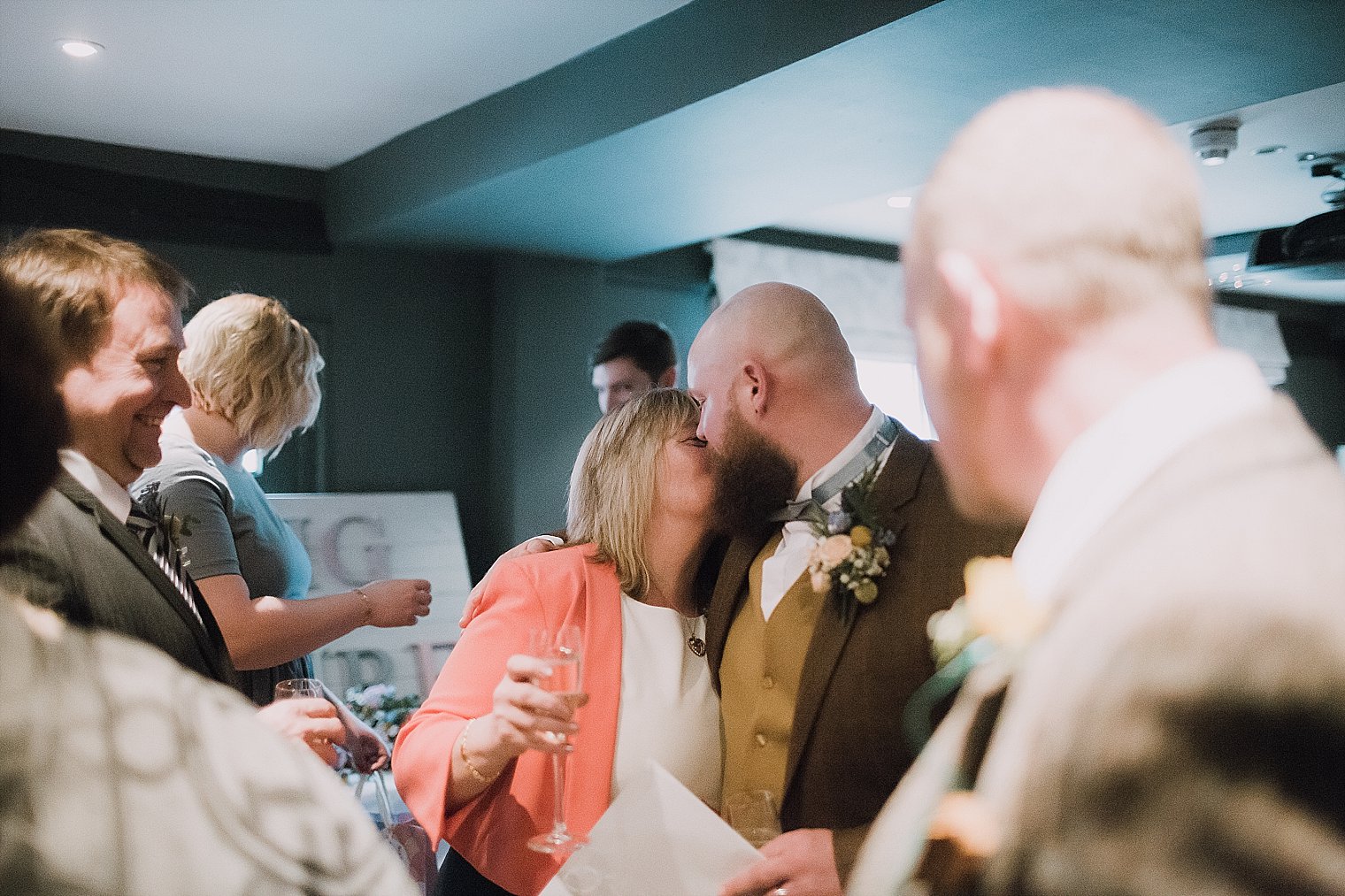 Groom hugging his mum