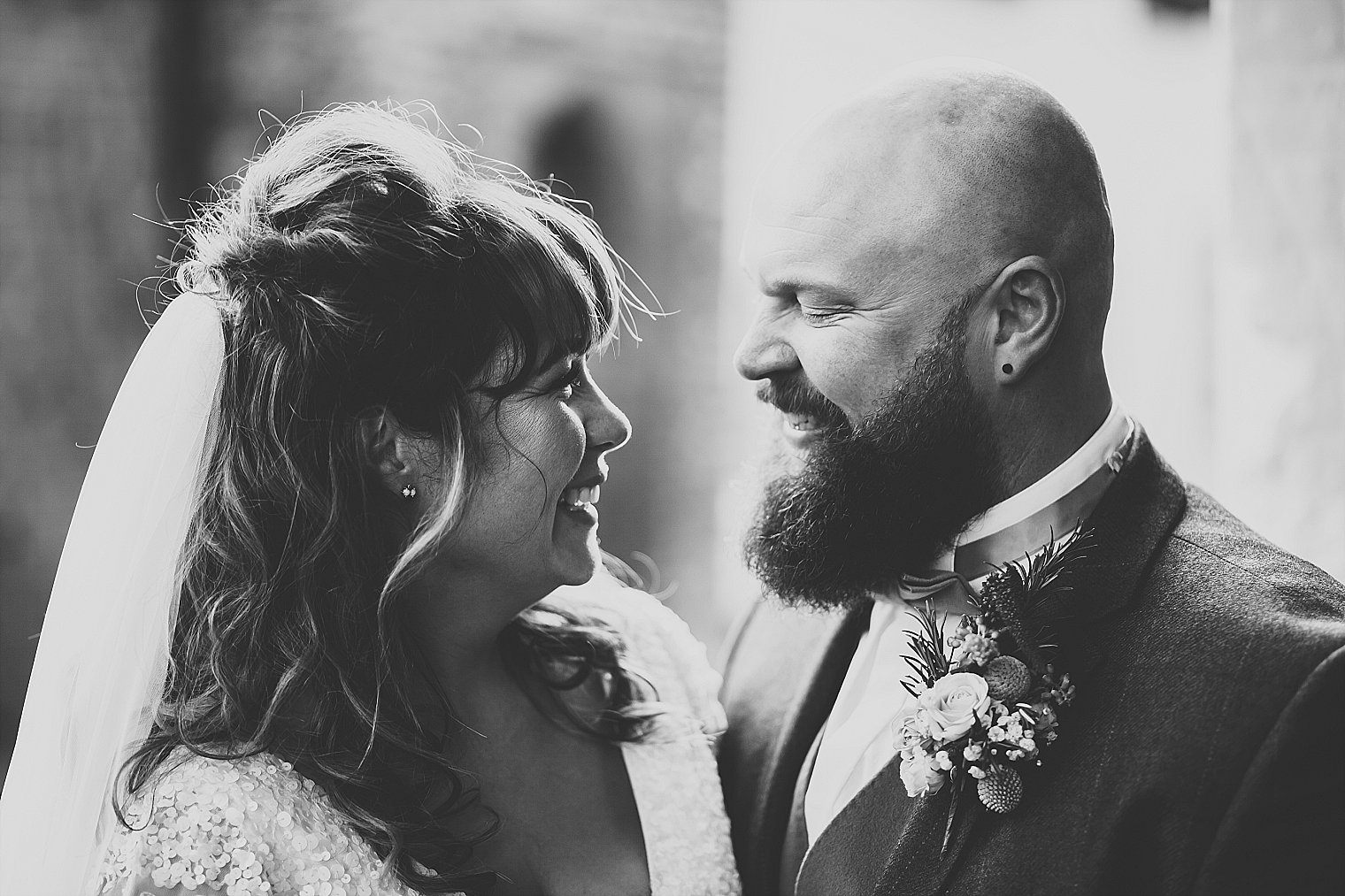 Bride and groom laughing