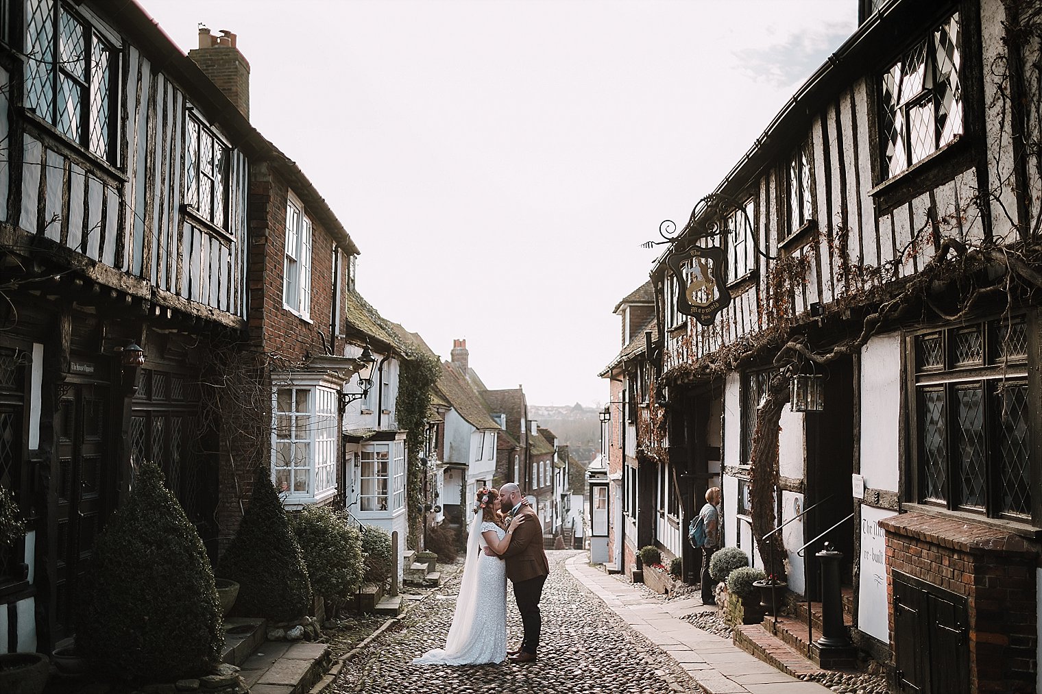 Bride and groom hugging eachother