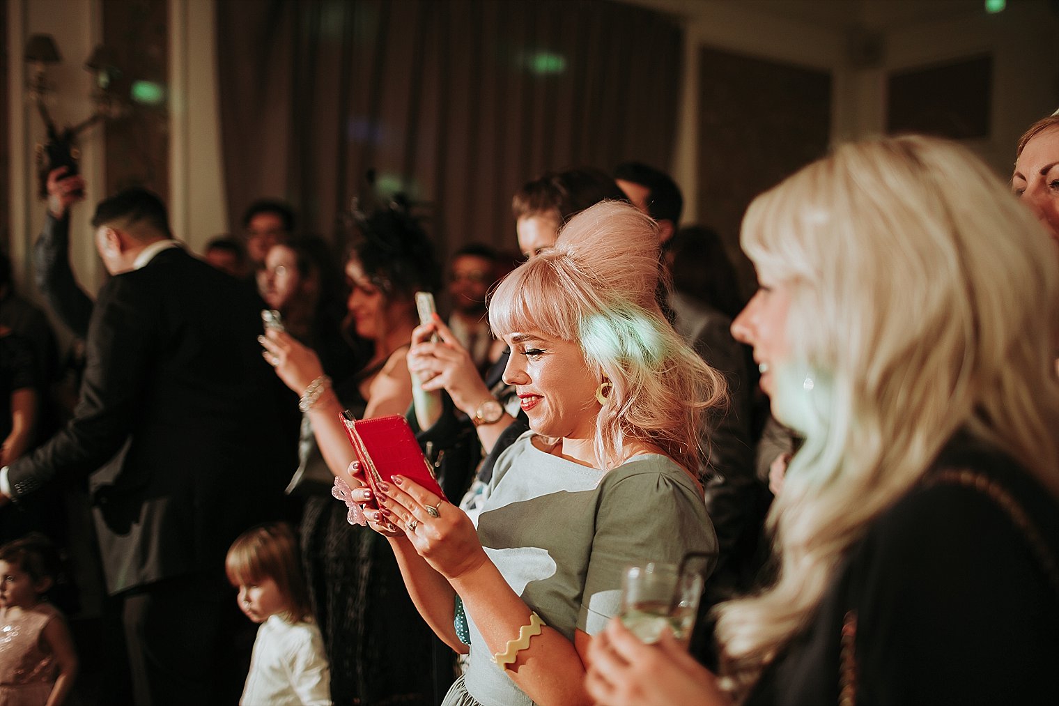 Maid of honour watching the first dance