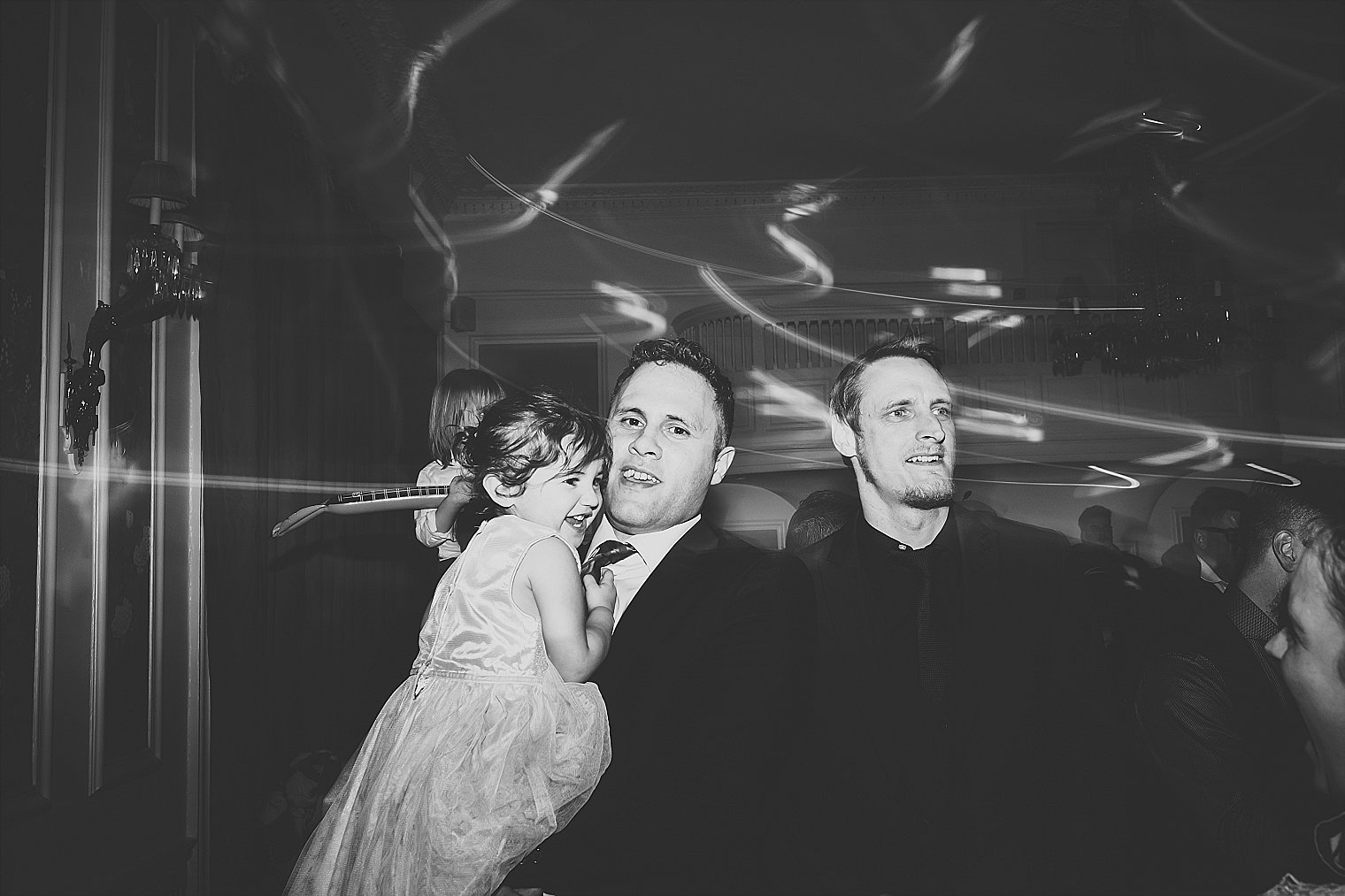 guest holding his daughter