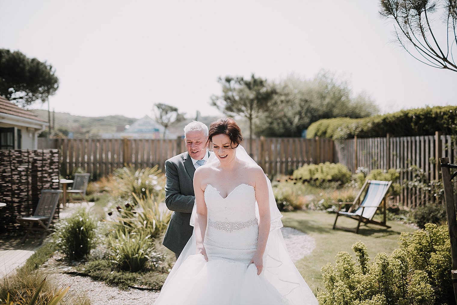 Bride walking with her father