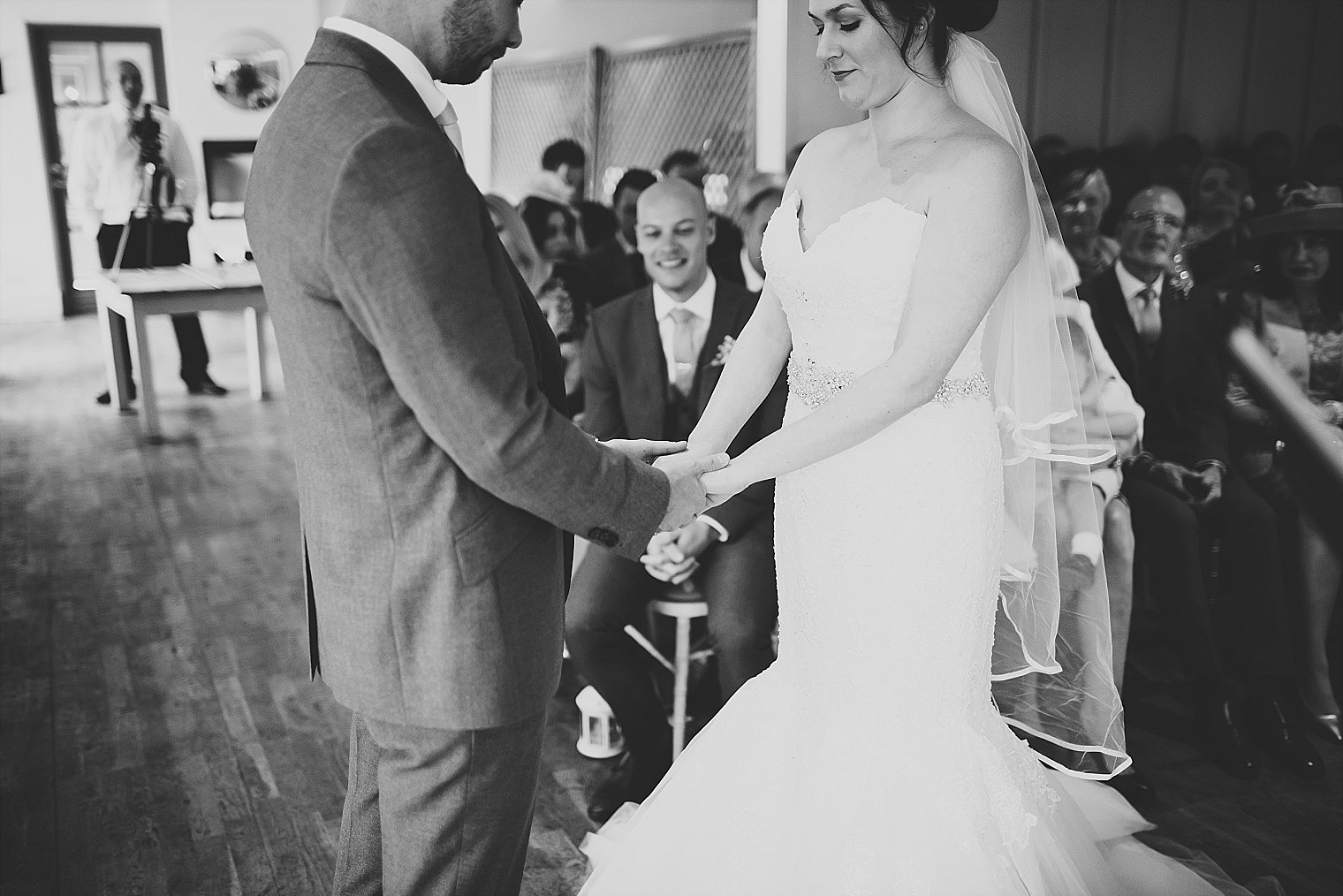 Bride and Groom holding hands