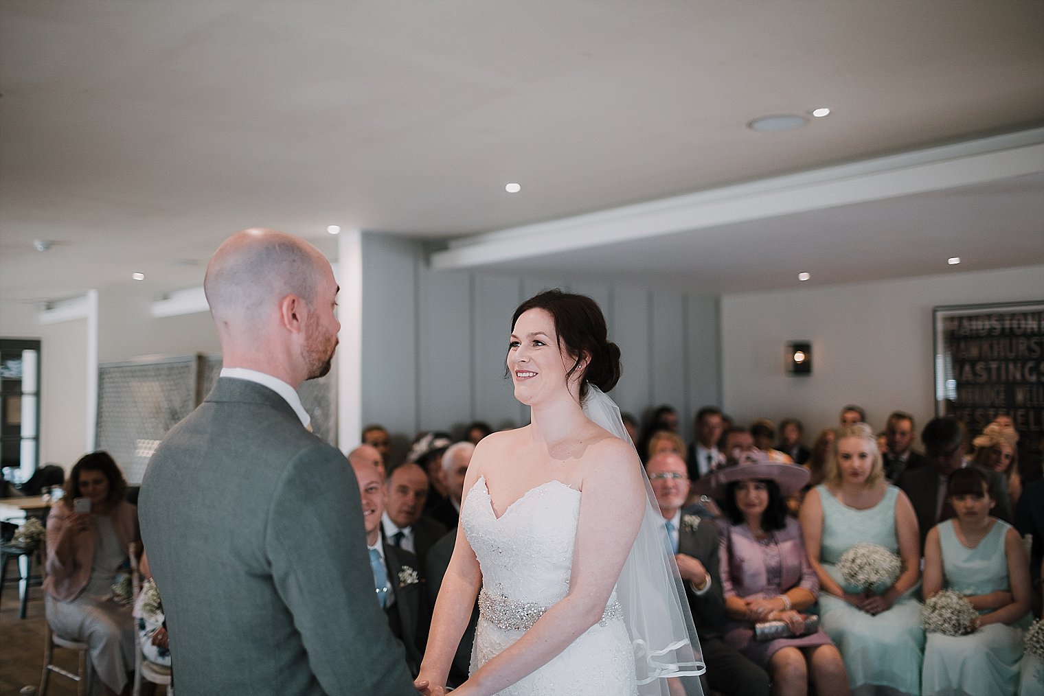 Bride laughing during the wedding service