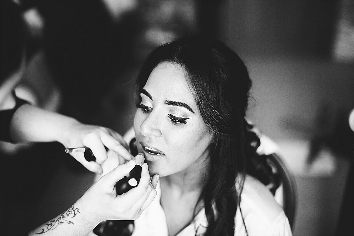 Bride having makeup