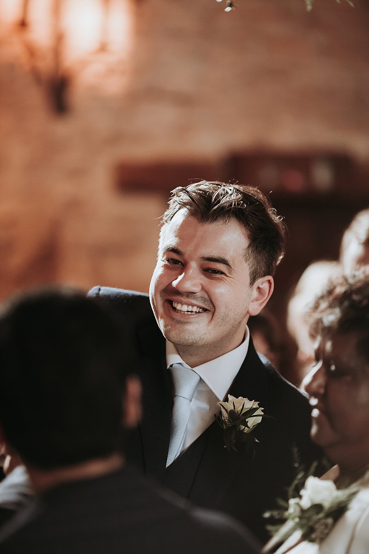 Groom smiling