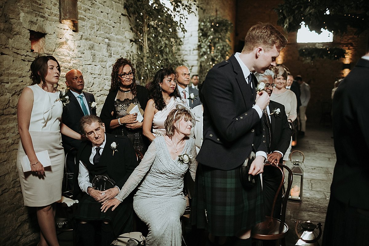 Mother of bride watching wedding service