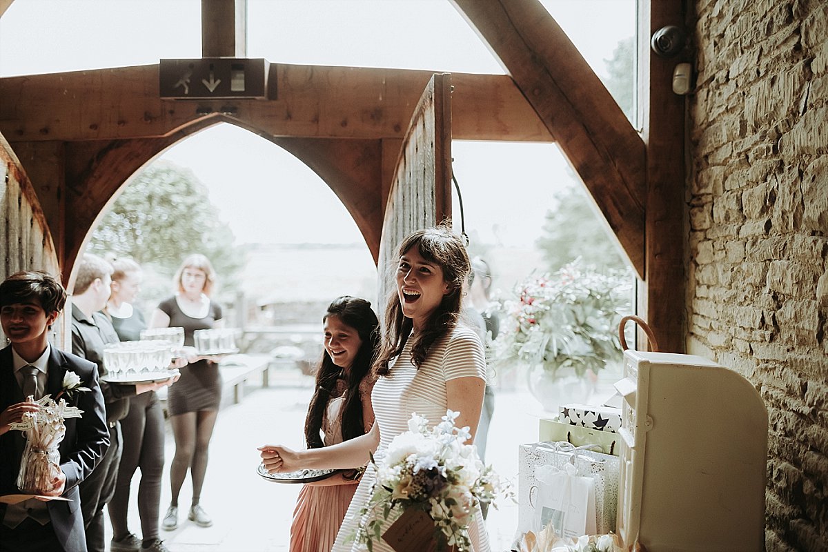 Bridesmaid laughing