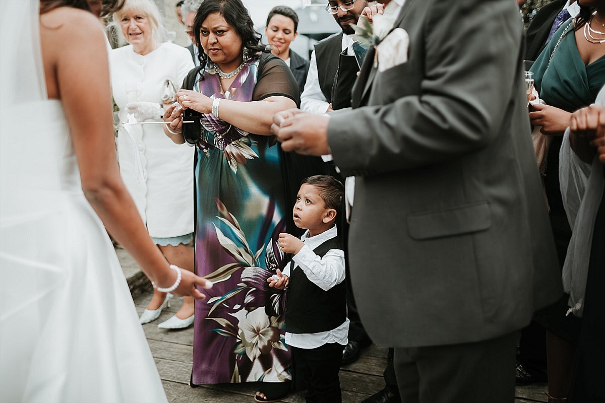 young wedding guest with wedding bubbles