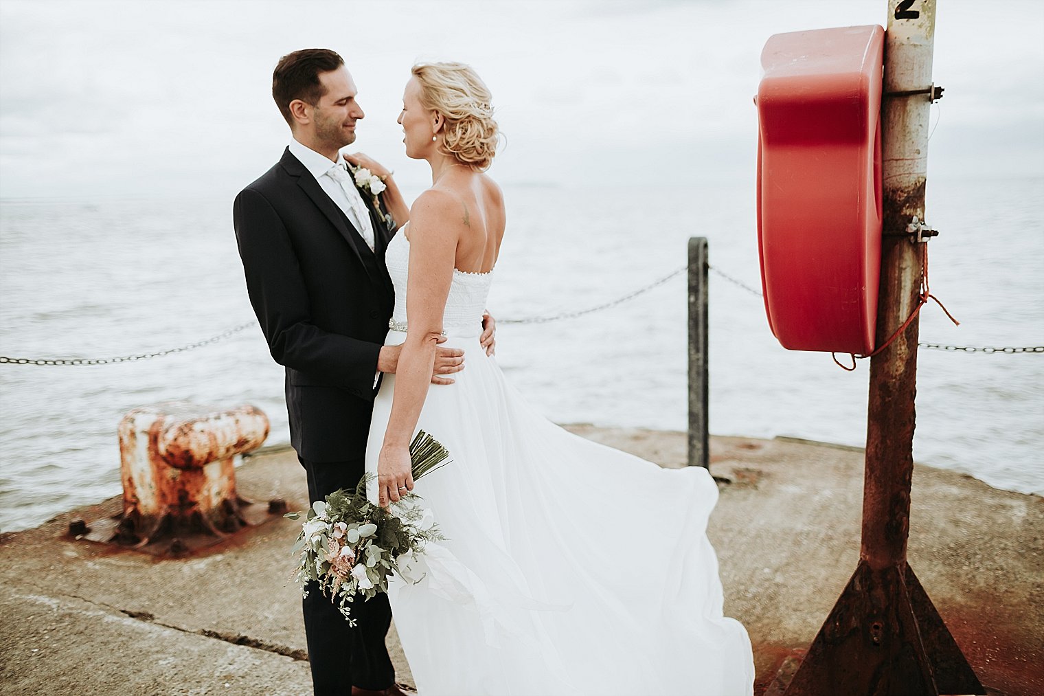 Bride and Groom posing for wedding portraits