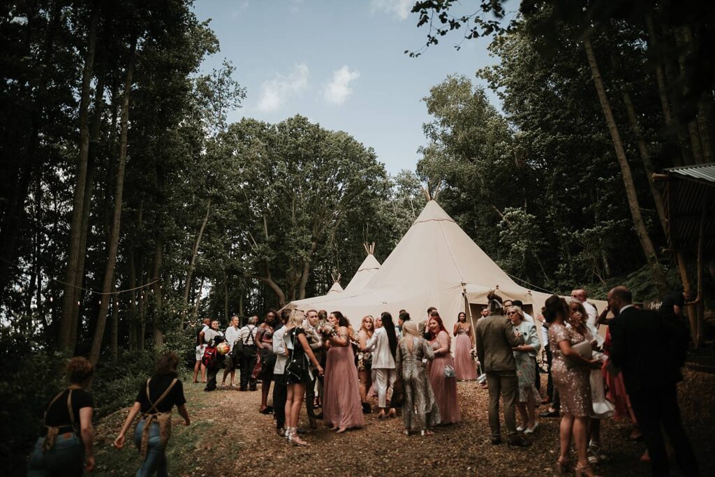 Wedding guests relaxing at the glade reception area at Wilderness Weddings
