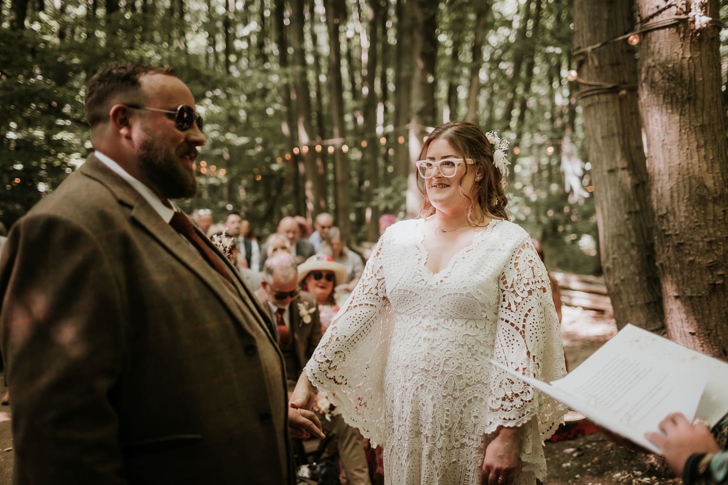 Bride laughing during wedding ceremony