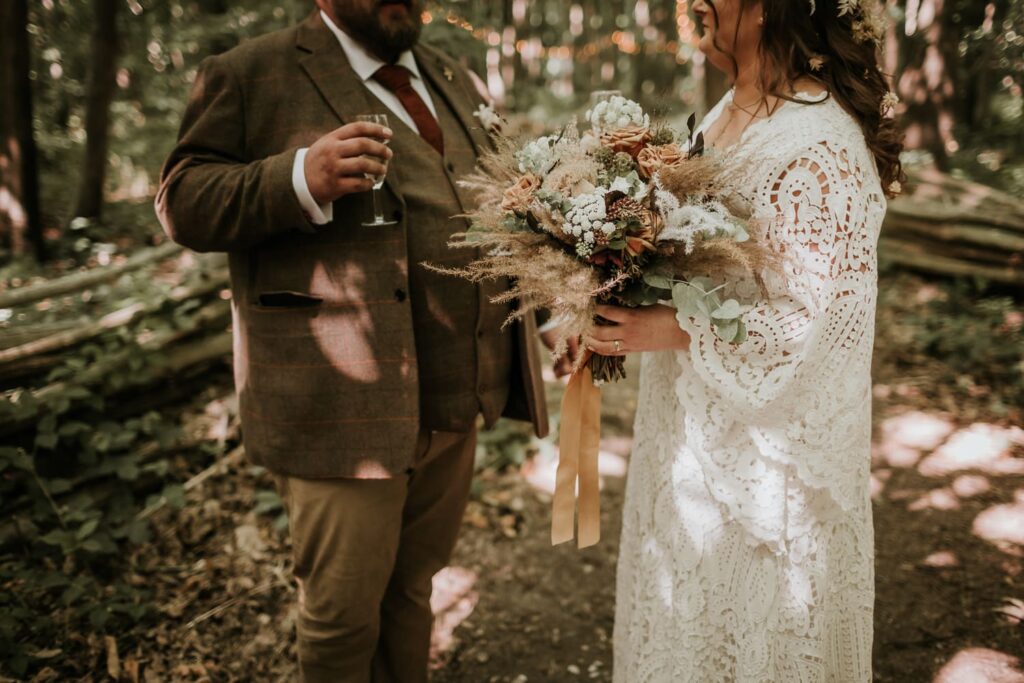 Bride and groom sharing a drink