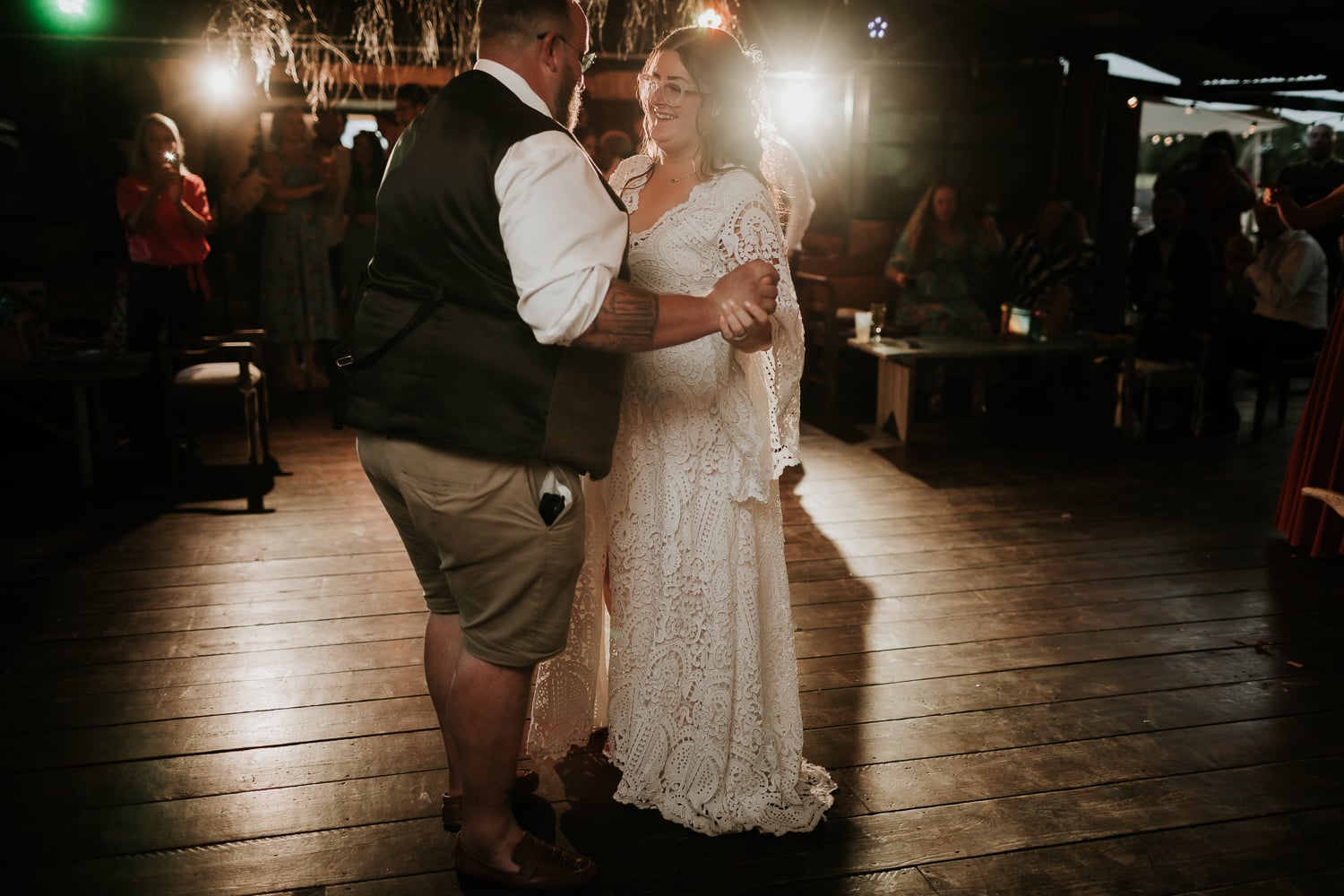 Bide and Groom sharing their first dance in the barn at The Dreys Wedding Venue