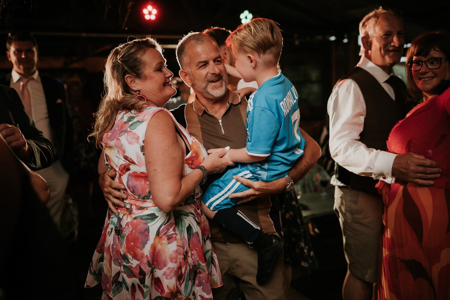 Parents of the bride dancing during the evening reception at The Dreys