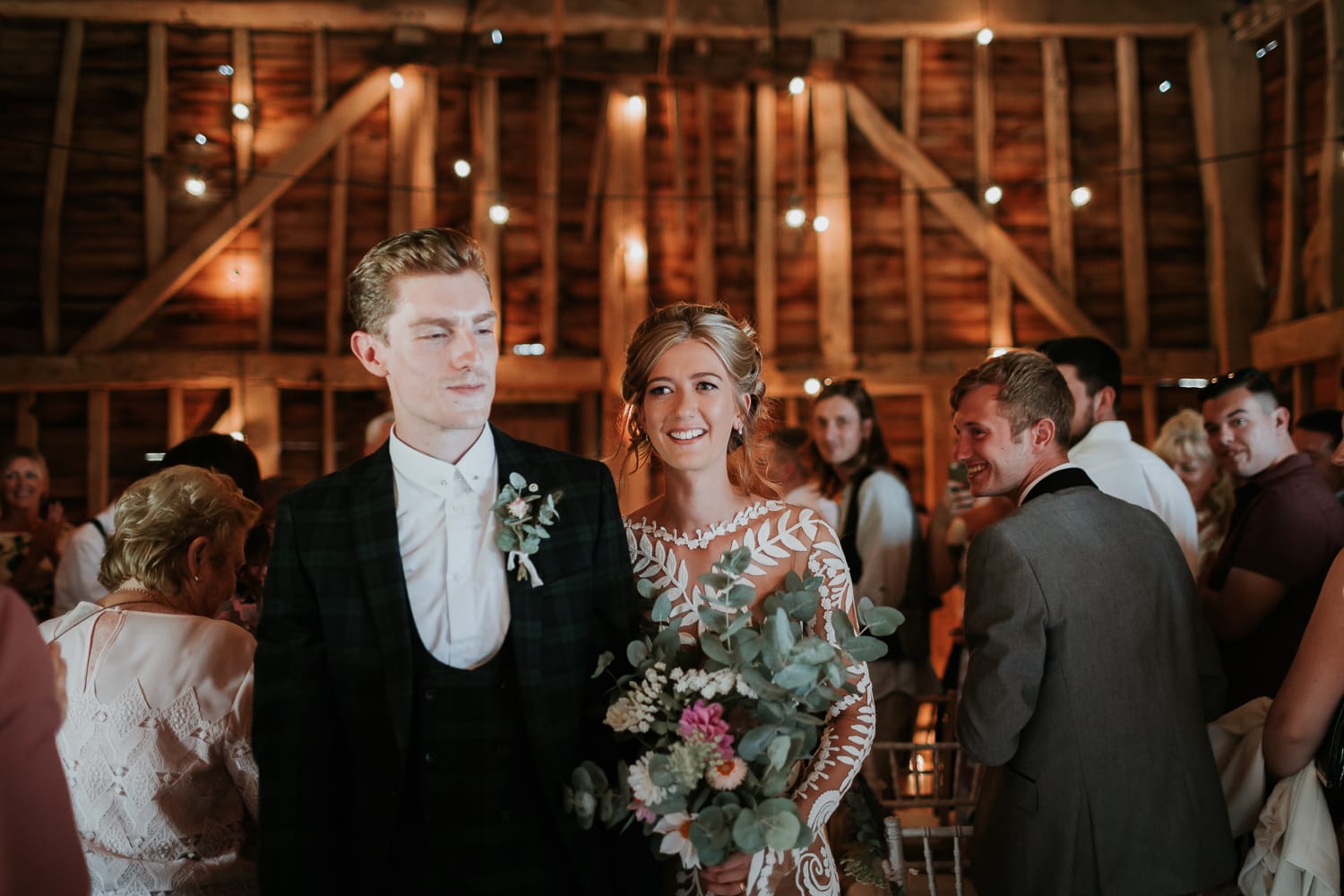 bride and groom walking down the aisle
