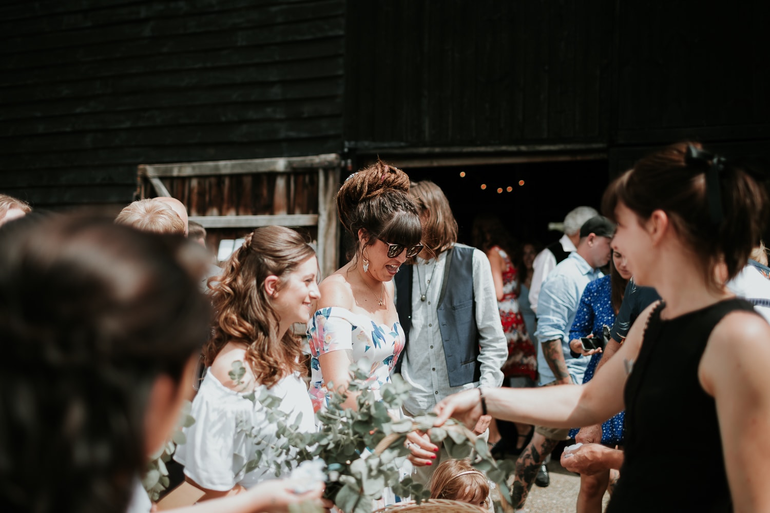 wedding guest holding confetti